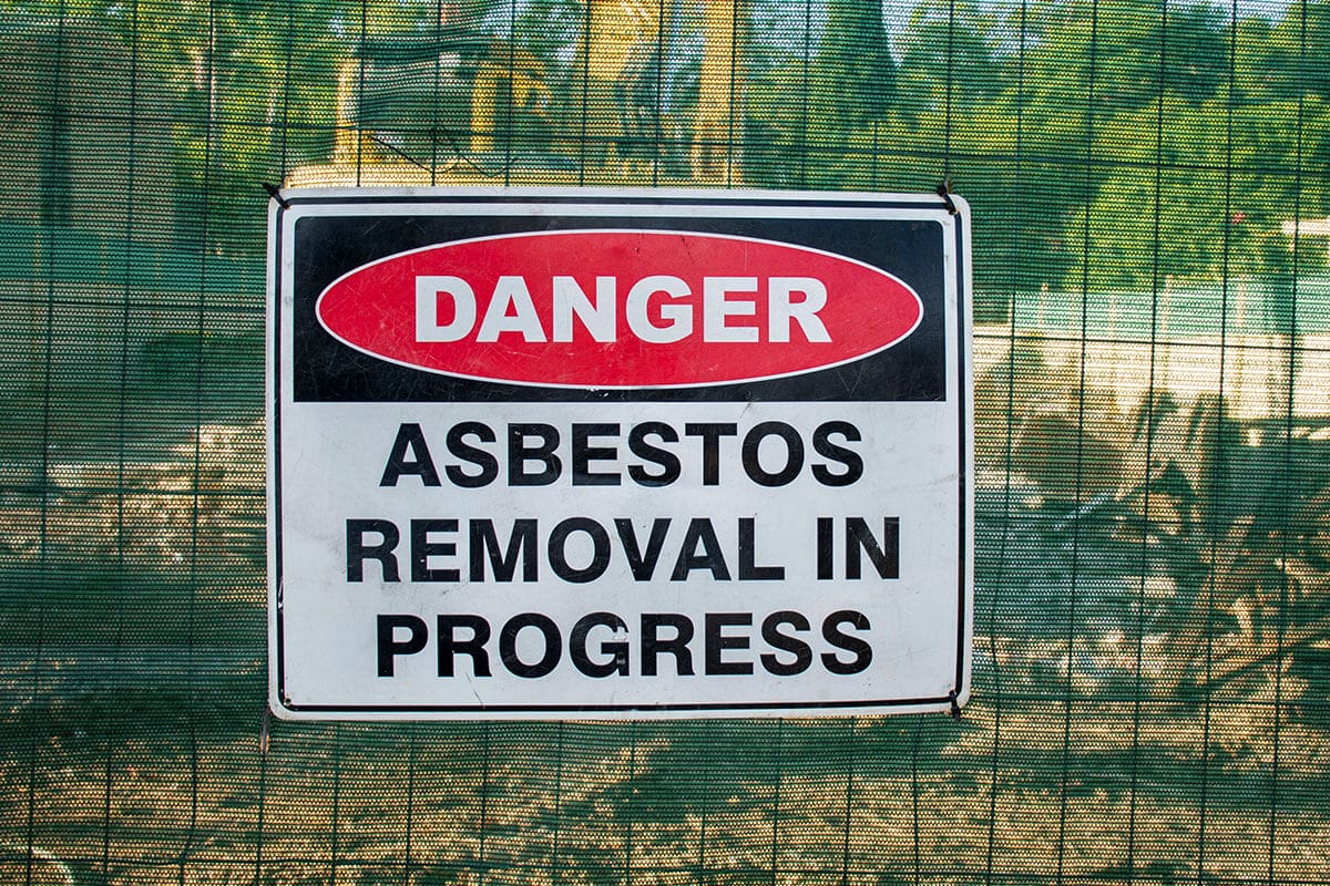 Licensed asbestos removal team safely removing asbestos from a roof in Sydney.